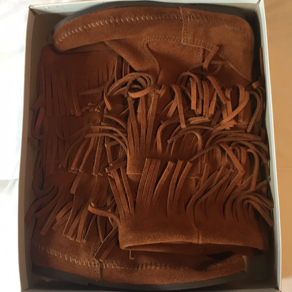 Brown fringe moccasins